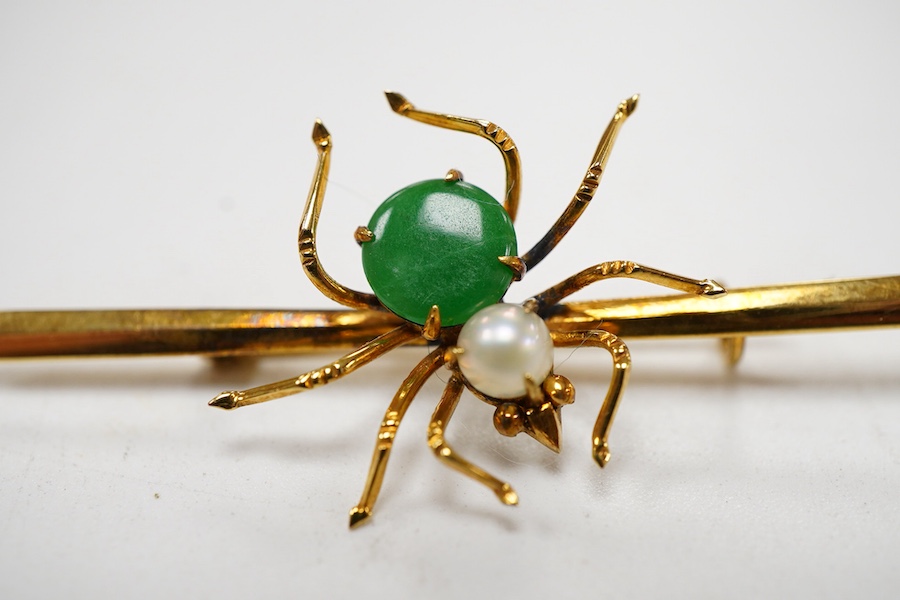 A Far Eastern 14k yellow metal, jade and cultured pearl set spider bar brooch, 47mm, gross weight 1.9 grams.